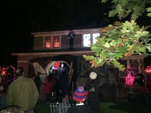 halloween party in front of decorated house