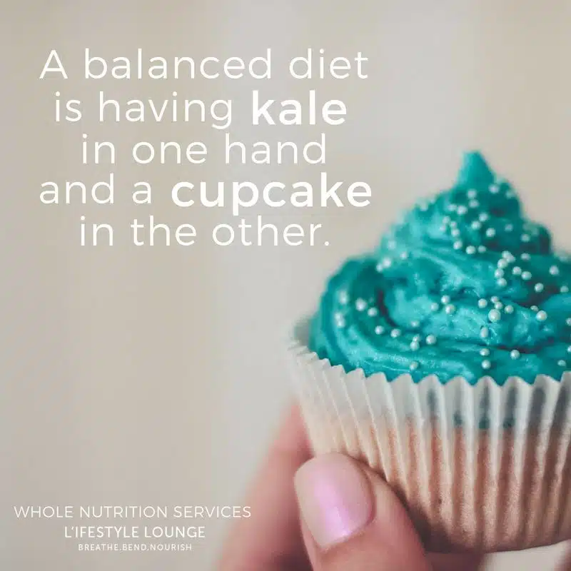 a balanced diet is having kale in one hand and a cupcake in the other