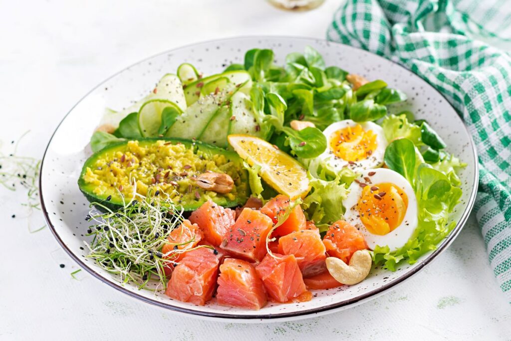 ketogenic-diet-breakfast-salt-salmon-salad-with-greens-cucumbers-eggs-avocado-keto-paleo-lunch