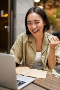 happy woman on video call with friend