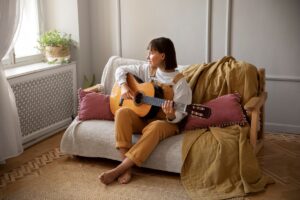 young woman playing music