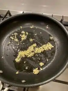 garlic sautéing in pan 