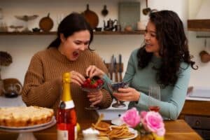 happy women eating food together