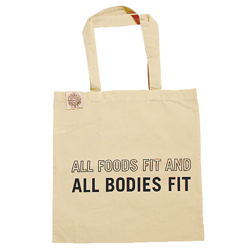 autism awareness canvas tote bag with the words all foods fit and all bodies fit written on it in bold type