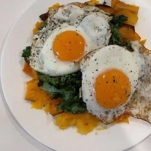 sunny bow eggs over mashed butternut squash and kale
