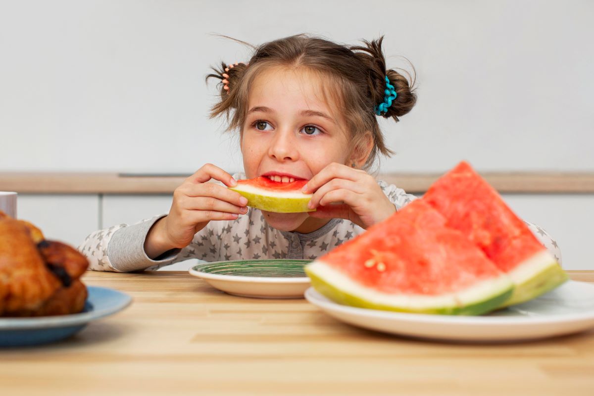 child with metabolic syndrome intuitively eating fruit